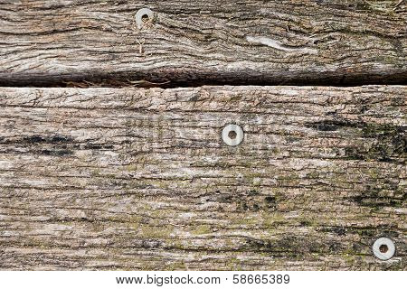 Texture Of Old Weathered And Discolored Wooden Boards