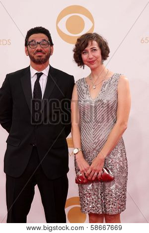 Kristen Schaal and Al Madrigal at the 65th Annual Primetime Emmy Awards Arrivals, Nokia Theater, Los Angeles, CA 09-22-13