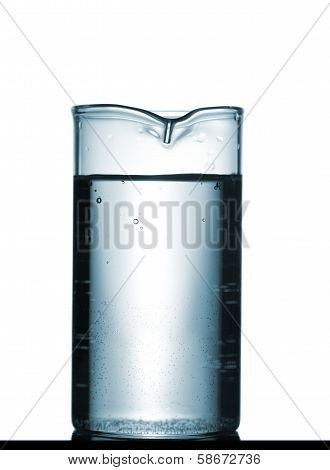 Isolated Chemical Beaker On Table With Solution