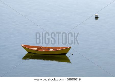 Small yellow row boat