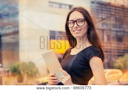 Young Woman with Tablet Out in the City