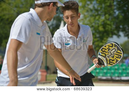 MOSCOW, RUSSIA - JULY 17, 2014: Men team San Marino in the match with Bulgaria during ITF Beach Tennis World Team Championship. San Marino won in two sets