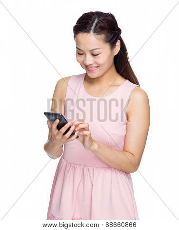 Asian woman texting on mobile phone