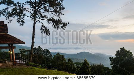 Tourists Are Standing Views Of High Mountains And Haze.