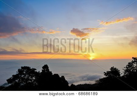Colorful Sunrise Above The Clouds