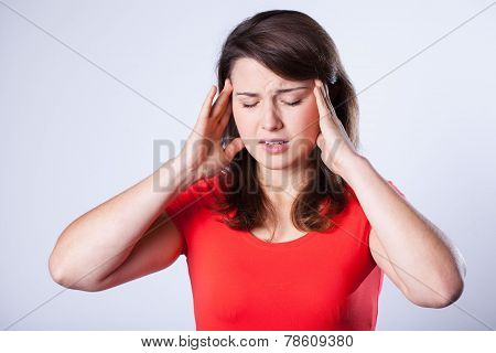Woman Suffering From Headache