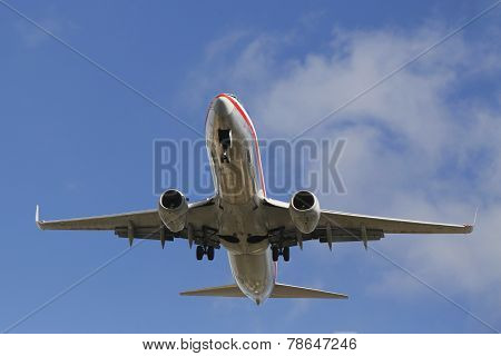 American Airlines jet descending for landing San Diego International Airport