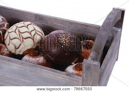 traditional jewish holiday chanuka donuts in retro vintage tray isolated on white background