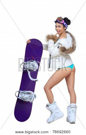 Sexy dressed woman with snowboard