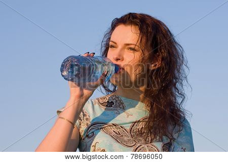 Woman Drinking Water Outdoor