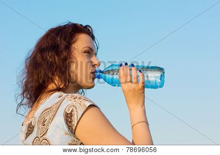 Woman Drinking Water Outdoor