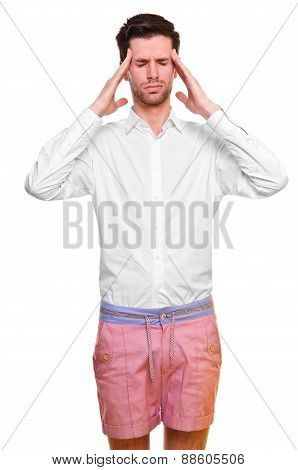 A Young Man Grasping His Head