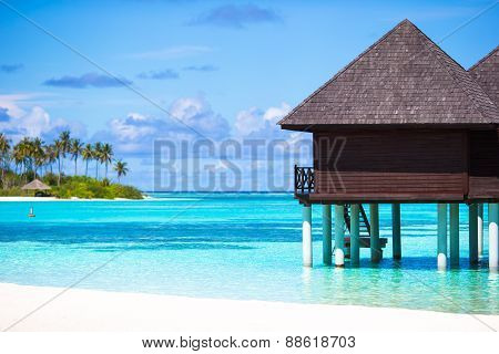 Water bungalows with turquiose water on Maldives