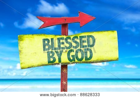 Blessed By God sign with beach background