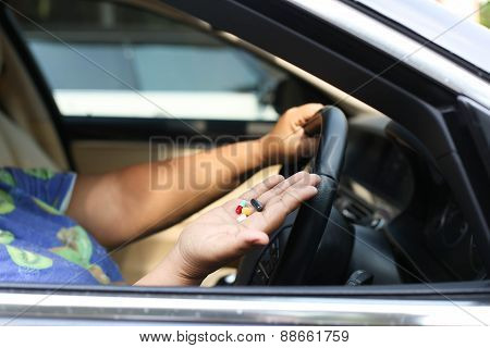 Women Taking Pills Inside His Car