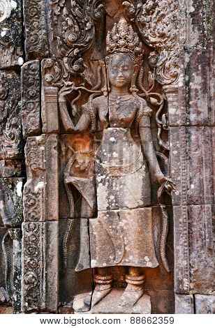 Apsaras and bas relief wall carving in Banteay Kdei, Angkor Wat