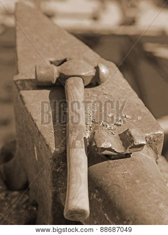 Heavy  Anvil And Sturdy Hammer In The Blacksmith's Shop