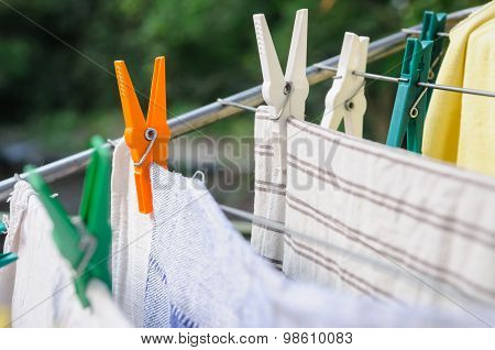 Laundry Pins And Hanged Clothes