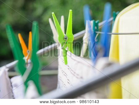 Laundry Pins And Hanged Clothes