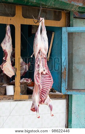 Lamb Meat Hanging In A Butcher Shop. Srinagar, India
