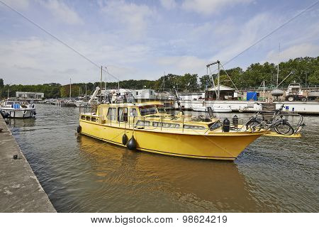 Yellow Boat Leaving The Brussels Oldest Yacht Club