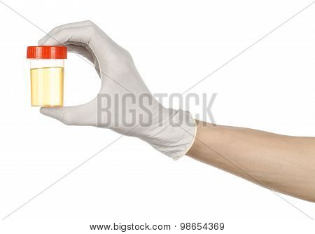 Medical Theme: Doctor's Hand In White Gloves Holding A Transparent Container With The Analysis Of Ur
