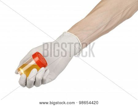Medical Theme: Doctor's Hand In White Gloves Holding A Transparent Container With The Analysis Of Ur