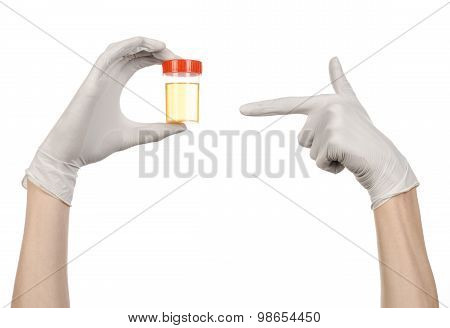 Medical Theme: Doctor's Hand In White Gloves Holding A Transparent Container With The Analysis Of Ur