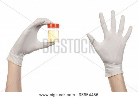 Medical Theme: Doctor's Hand In White Gloves Holding A Transparent Container With The Analysis Of Ur
