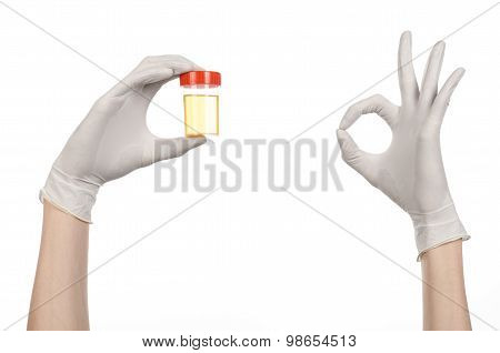Medical Theme: Doctor's Hand In White Gloves Holding A Transparent Container With The Analysis Of Ur