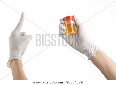 Medical Theme: Doctor's Hand In White Gloves Holding A Transparent Container With The Analysis Of Ur