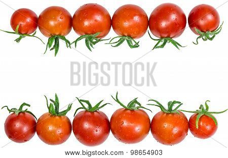Fresh red tomatoes with leaves on white background