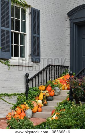 Pumpkins in front door to celebrate Thanksgiving and Halloween
