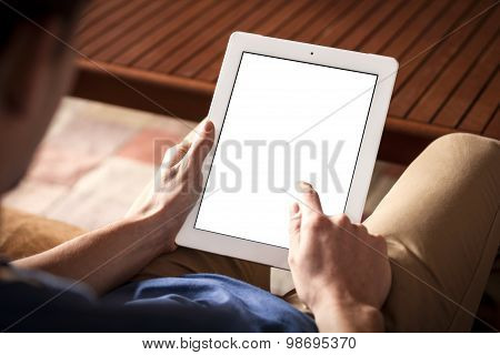 Person using the digital tablet in living room