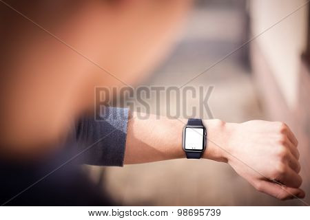 Hand wearing elegant smartwatch