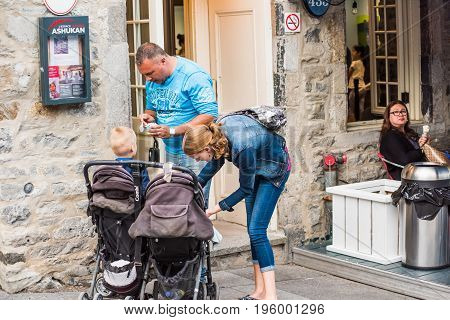 Montreal, Canada - May 27, 2017: Old Town Area With People Family With Children Eating Ice Cream Out