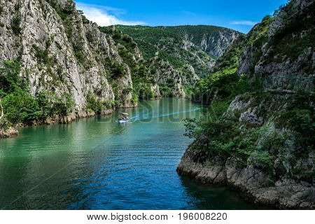 Motor boat in the lake of Canyon Matka in Macedonia