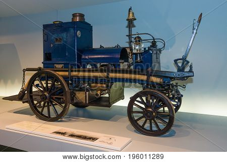 STUTTGART GERMANY- MARCH 19 2016: Daimler motorized fire-fighting pump (Daimler Motor-Feuerspritze) 1892. Mercedes-Benz Museum.