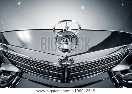 STUTTGART GERMANY- MARCH 19 2016: Fragment of full-size luxury car Mercedes-Benz 300 SEL 6.3 1972. Black and white. Mercedes-Benz Museum.