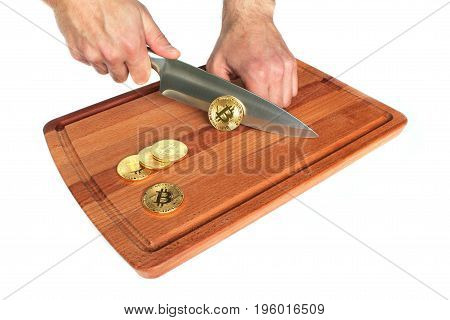 Abstract extraction of Bitcoins. Cutting coins. Creative