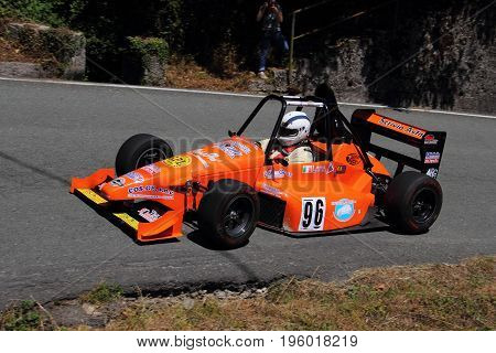 Malvaro Favale Italy - July 16 2017: Uphill Race Race Favale Castello: The F1 racing car type L.R. Conducted Roberto Loda in action on the path.