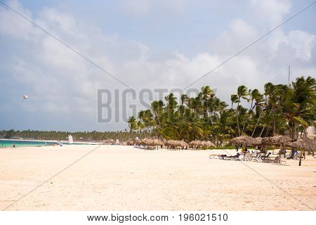 View Of The Sandy Beach In Punta Cana, La Altagracia, Dominican Republic. Copy Space For Text.