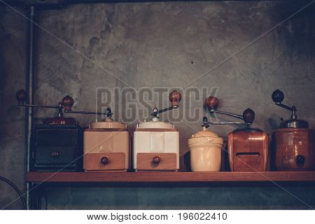 Old-fashioned Display of Hand Coffee Grinder with copy space for your text layouts. concreat backgroundColour Retro style Thailand
