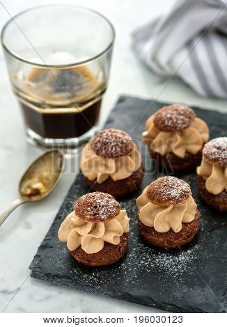 Cake Shu On The Stone Board With Coffee