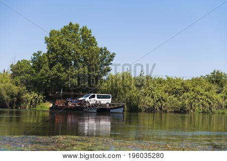 A Ferry For Cars Across The River, Tarragona, Catalunya, Spain. Copy Space For Text.