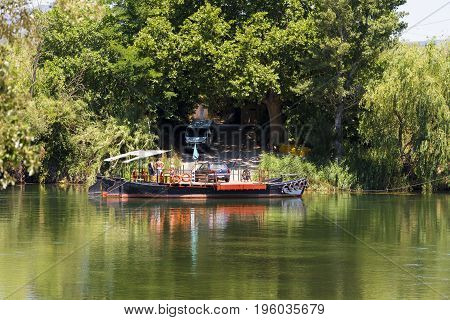 A ferry for cars across the river Tarragona Catalunya Spain. Copy space for text