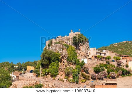 The Mountain Town Of Pratdip In Spain. Copy Space For Text. Isolated On Blue Background.
