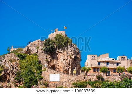 The Mountain Town Of Pratdip In Spain. Copy Space For Text. Isolated On Blue Background.