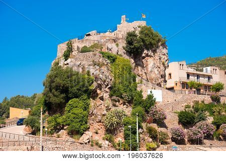 The Mountain Town Of Pratdip In Spain. Copy Space For Text. Isolated On Blue Background.
