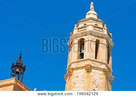 View Of The Tower Of The Church Of Sant Bartomeu And Santa Tecla In Sitges, Barcelona, Catalunya, Sp